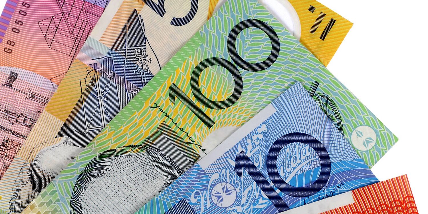 Australian dollar bills isolated on white